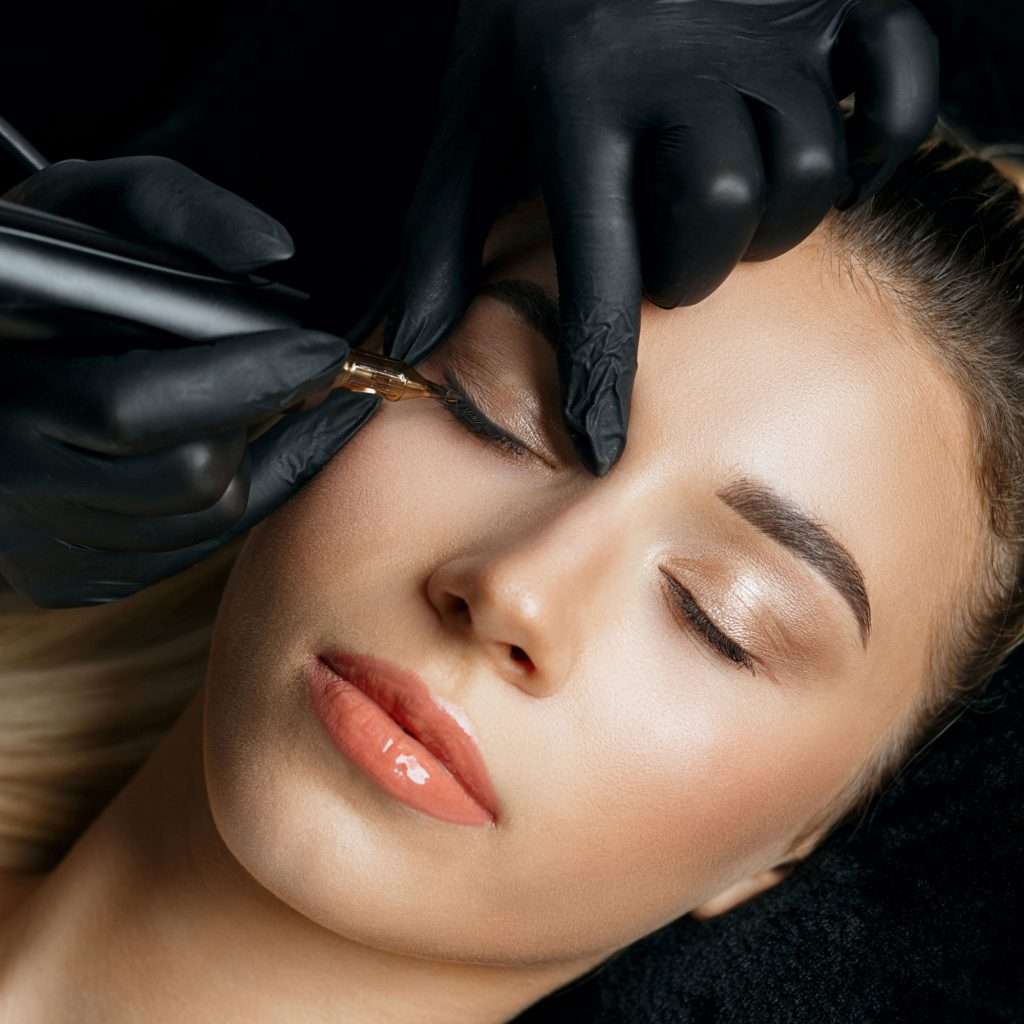 Woman having Permanent Makeup Procedure done